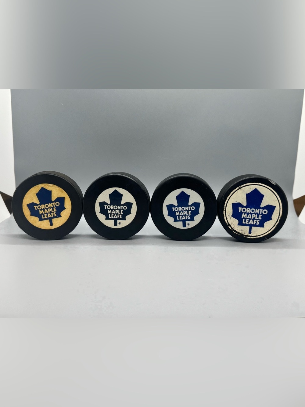 Vintage Toronto Maple Leafs Hockey Puck Lot – Cooper NHL Licensed – 4 Pucks